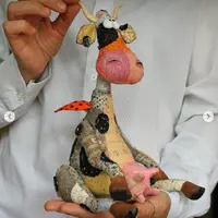 Корова Майя