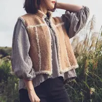 Жилет вязаный спицами из объемной пряжи Mellow Vest