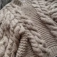 Свитер с косами